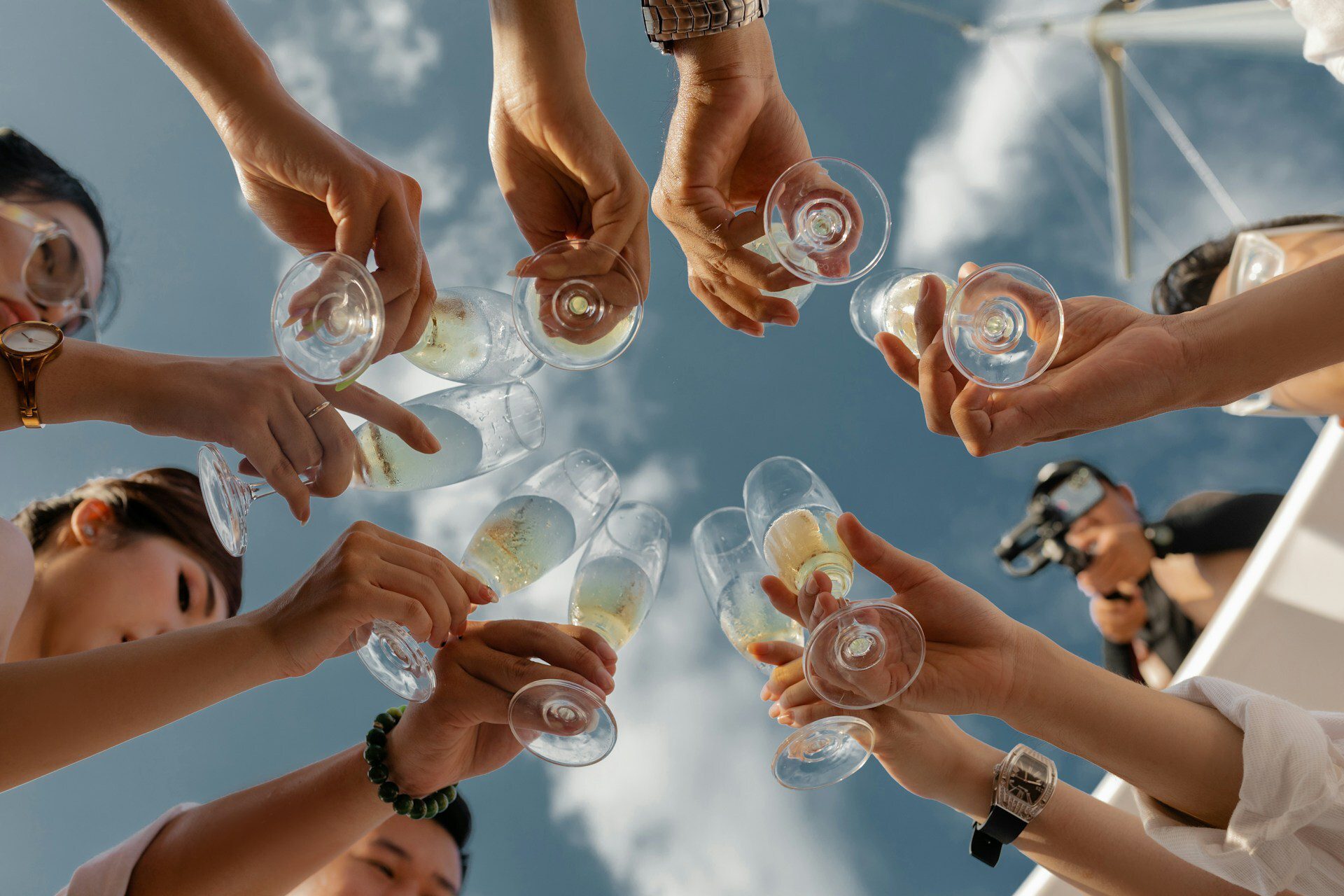 Champagne toast seen from below